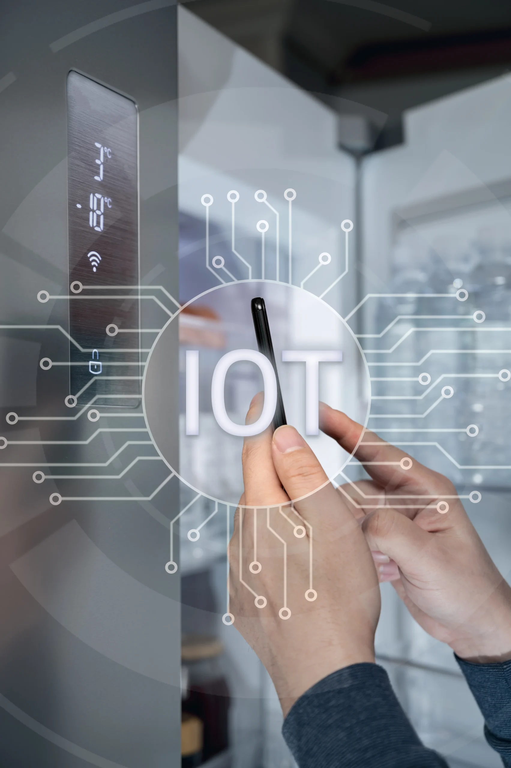 hand-man-who-controls-refrigerator-with-his-smartphone-internet-things-concept IOT solutions